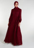 This Crinkled Chiffon Maxi Burgundy is fully lined, lightweight, and airy. It also has the option of a belt and pockets for added convenience. The chiffon material adds texture.