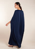 Add a touch of elegance to your wardrobe with our Crinkled Kaftan Navy. Made from a lightweight soft crinkle non-crease fabric, this gown is perfect for warmer weather. Dark blue loose fit kaftan