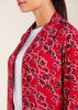 Expertly crafted with a loose fit and delicate lace trim, this kimono style top features small side slits. Perfect for everyday wear, this kimono adds a touch of elegance to any outfit. Pair it with one of our full slips for an elevated look, and take advantage of the convenient discreet side pockets. Red with floral print.