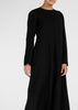 Cut in an A line silhouette with a round neck collar &amp; semi fitted sleeves. Features a concealed zip fastening at the back for easy access. Black