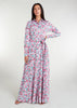 Featuring a vibrant floral pattern with an optional belt for styling, standard collars, discreet side pockets, and buttons all the way down, this maxi dress is perfect for any occasion. It is also suitable for nursing, making it a practical and stylish choice for any mother. Light blue base colour with pink roses and green thorns and leaves.