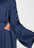  Satin Strip Kaftan in a deep blue hue features a luxurious satin strip detailing on the neckline and sleeves, creating a modest and sophisticated silhouette. Perfect for any occasion, this kaftan exudes a sense of luxury and style.