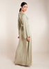 Discover the elegant and versatile Side Tie Abaya in an exquisite soft sage colour, crafted from a luxurious cotton satin blend that provides a subtle sheen. This abaya features a unique attached side belt that adds shape and dimension to the garment.&nbsp;