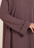 This elegant Two Piece Open Abaya set includes a Full Sleeve matching inner dress. Perfect for everyday wear, it can also be dressed up with accessories for an evening look. The open abaya can be worn as a maxi on its own or paired with the inner dress for a stylish ensemble. In brown.