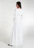 This fully lined white abaya boasts subtle pleats strategically placed at the waist to gently accentuate your figure. An optional belt is included for those who prefer a cinched waist.&nbsp;